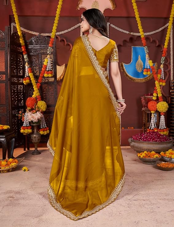 Women's Elegant Designer Sarees Premium Rangoli Fabric with Embellished Border, Lightweight and Stylish Ethnic Wear - Perfect for Parties, Weddings, and Festive Occasions.