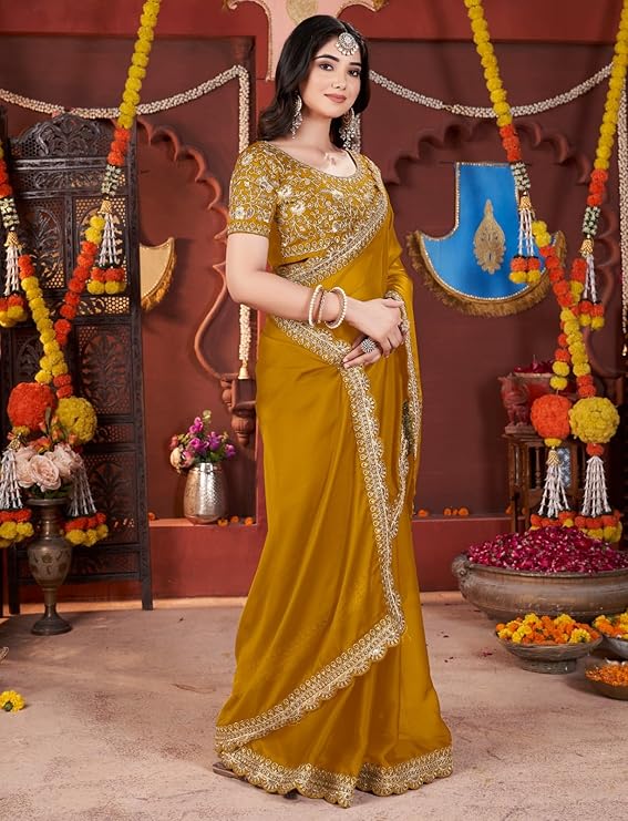 Women's Elegant Designer Sarees Premium Rangoli Fabric with Embellished Border, Lightweight and Stylish Ethnic Wear - Perfect for Parties, Weddings, and Festive Occasions.
