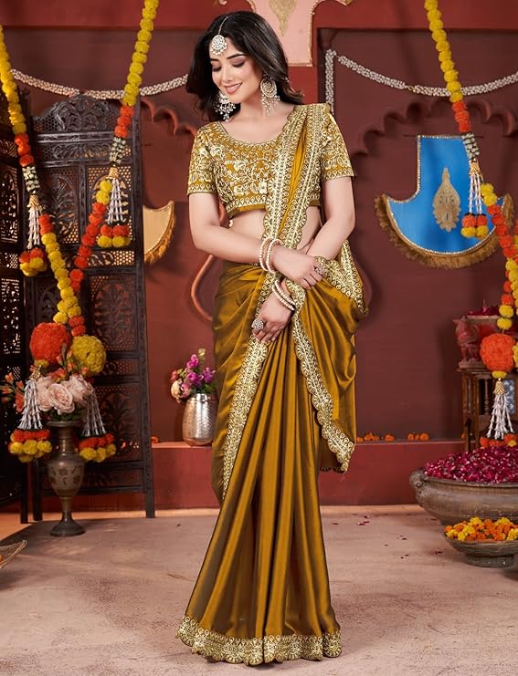 Women's Elegant Designer Sarees Premium Rangoli Fabric with Embellished Border, Lightweight and Stylish Ethnic Wear - Perfect for Parties, Weddings, and Festive Occasions.