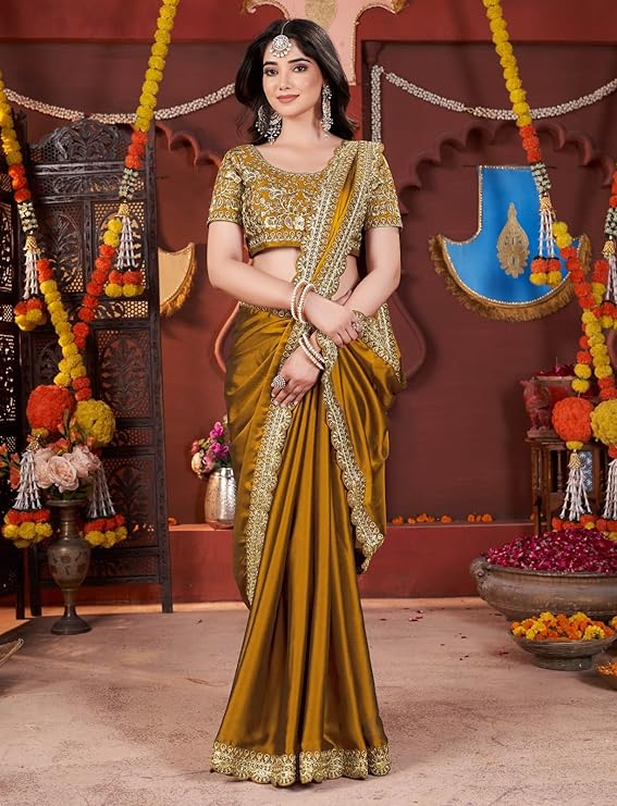 Women's Elegant Designer Sarees Premium Rangoli Fabric with Embellished Border, Lightweight and Stylish Ethnic Wear - Perfect for Parties, Weddings, and Festive Occasions.