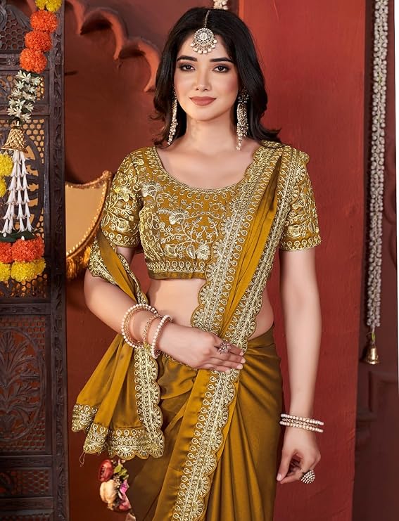 Women's Elegant Designer Sarees Premium Rangoli Fabric with Embellished Border, Lightweight and Stylish Ethnic Wear - Perfect for Parties, Weddings, and Festive Occasions.